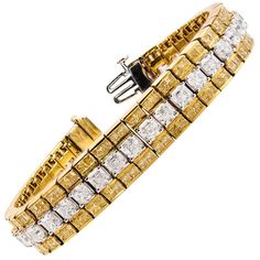 A very bold and elegant bracelet, showcasing one row of Asscher cut white diamonds weighing 15.70 carats total, channel-set between two rows of princess cut fancy yellow diamonds weighing 10.99 carats total. Finely made with an 18K yellow gold mounting. Perfect accessory to complement any outfit. Roman Malakov is a custom house, specializing in creating anything you can imagine. If you would like to receive a special quote on a custom piece please message or call us. Diamonds Bracelet, White Gold Bangle, Asscher Diamond, Yellow Diamonds, Gold Link Bracelet, Fancy Yellow Diamond, Antique Bracelets, Diamond Bangles Bracelet, Bracelets Gold Diamond