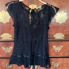 Vintage Forever 21 Elegant Classy Black Lace Blouse With Tie In The Back And Front. I’ve Had This For Soooo Long But Have Never Worn It! Summer Lace Top For Night Out With Short Sleeves, Sheer Summer Blouse For Date Night, Feminine Black Lace Top For Summer, Sheer Blouse For Date Night In Summer, Black Sheer Feminine Top, Black Sleeveless Blouse Top For Date Night, Feminine Black Blouse For Date Night, Feminine Lace Top Blouse For Night Out, Forever 21 Black Fitted Blouse