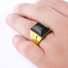 Metal: 14k Yellow Gold Onyx: 1.3cm x 1.8cm (0.5" x 0.7") shape - cabochon setting type - Bezel setting Product weight: 10.0 gr Compelling color and bold design help you make a strong style statement! Power and beauty come to mind in the presence of this stunning 14k gold ring. One large onyx cabochon anchors the piece at the center. The right ring can speak volumes about your personal taste and aesthetic. ----------------------------------------------------------------------Onyx The myth of the Stone Ring For Men, Stone Rings For Men, Famous Warriors, Yellow Gold Mens Rings, Gold Tiger Eye, Brown Tiger Eye, 10k Gold Ring, Gold Statement Ring, Black Ring