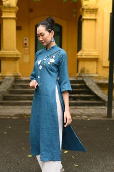 Traditional Fitted Cotton Ao Dai, Traditional Spring Kurta With Embroidered Hem, Traditional Embroidered Cheongsam For Spring, Traditional Embroidered Spring Cheongsam, Traditional Long Kurta For Spring, Summer Embroidered Long Sleeve Ao Dai, Traditional Embroidered Ao Dai, Traditional Straight Kurta Embroidered Dress For Spring, Traditional Embroidered Straight Kurta Dress For Spring