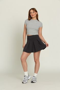 Our Off-Black Wide Pleat Tennis Skirt is a freshly designed take on our famous pleated tennis skirt. The wide pleats provide more length than the original pleated skirts and add a touch of sophistication to any outfit. It features built-in spandex shorts that include a comfortable fit and side pockets for storage. Tenis Skirt Outfits Black Summer, Tenis Skirt Outfits, Tennis Skirt Outfit Black, Checked Skirt Outfit, Black Tennis Skirt Outfit, Black Tennis Skirt, Checked Skirt, Tennis Skirt Outfit, Pleated Tennis Skirt