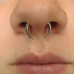 the nose has two small silver rings on it