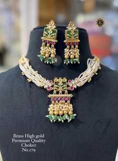 Description :- Antique Gold Plated Indian Jewelry Set, Indian Choker, Pearl Necklace, Guttapusalu Necklace, Earrings, Temple Jewelry, South Indian Jewelry Gift yourself a royal look with this perfectly crafted kundan necklace set from Manalisstudio. Crafted with high quality kundan stones and pearls, it is impressive in design. The green enamel artwork adds perfect texture to the design. Perfect for weddings and festivities, this antique necklace set should be put on with your favorite sari or l White Kundan Necklace With Motifs In Temple Jewelry Style, Guttapusalu Necklace, Choker Pearl Necklace, Indian Jewelry Set, Choker Pearl, Indian Choker, Temple Jewelry, South Indian Jewelry, Royal Look