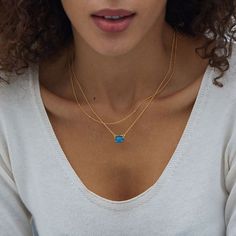 This delicate blue agate necklace is ideal for wearing alone or layered with other chains, making it a stylish everyday piece. Add a pop of color to your outfit with this elegant piece. Material: 925 silver plated with 18K goldGemstone: blue agatePendant size: 1.2*1cmChain length: 40+5cm Dainty Blue Birthstone Necklace For Everyday, Elegant Blue Charm Necklace With Adjustable Chain, Elegant Blue Crystal Necklaces With Adjustable Chain, Elegant Blue Crystal Necklace With Adjustable Chain, Sterling Silver Gemstone Necklaces For Layering, Blue Crystal Pendant Necklace With Clavicle Chain, Blue Pendant Charm Necklace For Everyday, Blue Charm Necklace With Adjustable Chain For Everyday, Blue Pendant Charm Necklaces For Everyday