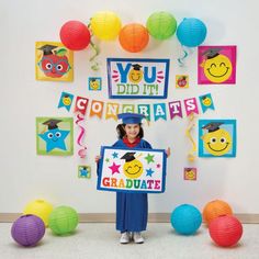 Make your graduation party space shine with these cheerful decorations! Featuring smiling apples, graduation caps, and other bright school icons, these colorful decorations are the perfect addition to your graduation party supplies. And best of all, with a variety of decorations to choose from, you can create the exact look you want for your elementary graduate's celebration. (31 pcs. per unit)Includes:o 12 Solid Color Paper Lanterns (12" Includes metal hanger. Simple assembly required.)o 1 Card