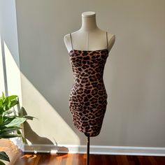 Never Worn With Tags Mini Cheetah Dress. Tiger Print Mini Dress For Night Out, Mini Dress With Tiger Print For Night Out, Tiger Print Mini Dress For Party, Fitted Tiger Print Mini Dress For Party, Fitted Tiger Print Mini Dress For Night Out, Tiger Print Mini Dresses For Date Night, Fitted Sleeveless Mini Dress With Tiger Print, Fitted Sleeveless Tiger Print Mini Dress, Fitted Tiger Print Dress For Night Out