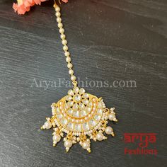 Bridal Rajwadi Kundan Mang Tika with Pearls Mang Tika: Approx. 5 Inches Hook feature to tie the mang tika to hair Made in Brass with golden finish and high quality Kundan stones Lightweight Jewelry Suitable for any occasion and traditional or Modern attire Ready to ship and available for local pickup from 23059. Please message us for more details Free shipping on orders above $75 within USA. Hand Set Tikka As Festive Gift, Hand Set Tikka For Festive Gift, Festive Hand Set Tikka As Gift, Kundan Tikka For Diwali Rituals, Traditional Adjustable Tikka With Stone Work, Festive Adjustable Tikka For Puja, Hand-set Tikka For Festivals Gift, Traditional Adjustable Kundan Necklace With Stone Work, Gold Tikka With Tilla As Gift