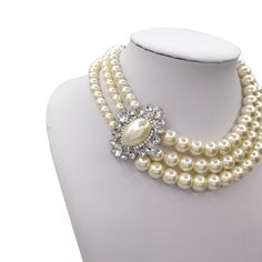 Beautifully made imitation Pearl necklace that has been made from glass. Great quality and beautifully designed. Elegant Glass Jewelry For Party, Adjustable Glass Necklaces For Formal Occasions, Elegant Round Glass Crystal Necklaces, Elegant Glass Jewelry For Wedding, Elegant Glass Wedding Jewelry, Elegant Glass Crystal Necklaces For Party, Round Glass Costume Jewelry Necklaces, Silver Glass Necklace For Wedding, Round Glass Costume Jewelry Necklace