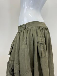 Fitted Knee-length Cargo Skirt For Summer, Summer Skirt With Patch Pockets And Relaxed Fit, Relaxed Summer Skirt With Patch Pockets, Spring Cargo Pocket Skirt, Summer Relaxed Skirt With Patch Pockets, Summer Mini Skirt With Multiple Pockets, Khaki Long Skirt With Pockets, Khaki Skirt With Pockets For Summer, Casual Summer Skirt With Patch Pockets