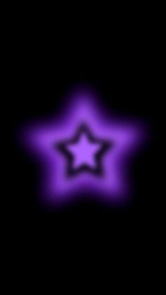 a purple star on a black background