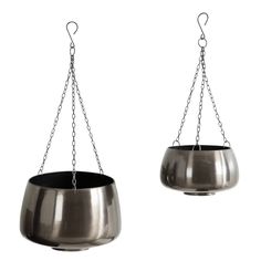 two metal hanging pots with chains attached to them