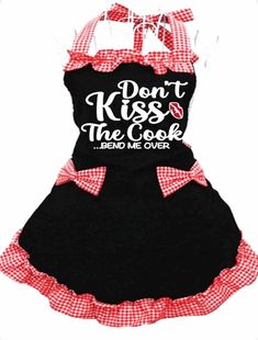 a black and red apron that says don't kiss the cook