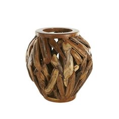 a vase made out of driftwood on a white background