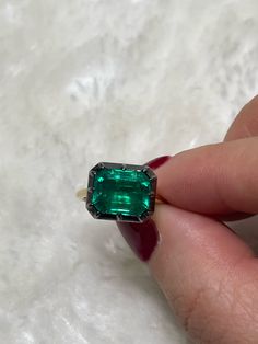 "Lower prices on our main website: https://discomarshmallow.myshopify.com/ The Georgian-Victorian Emerald Cut Emerald & Blackened Gold East West Button Back Collet Ring--a timeless engagement piece inspired by the grace of the Georgian and Victorian periods. This ring, featuring a stunning 3.5 ct lab-grown emerald in a Georgian cut-down collet setting and button back, exudes a timeless yet modern charm. It's not just an engagement ring; it's a versatile piece designed for stacking and layering w Brooch Jewelry, Solid Gold Jewelry, Dress Inspiration, Perfect Engagement Ring, The Grace, East West, Natural Sapphire, Emerald Ring, Gold Yellow