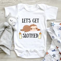 Let's Get Slothed Baby Bodysuit, Baby Bodysuit, Funny Baby Bodysuit, Baby Shower Gift, Sloth Baby Bodysuit, Gift For Baby Shower, Baby Gift 💗 Welcome to The MintedWildflower Etsy Shop! DESCRIPTION: An adorable baby bodysuit with softness that is perfect for an infant's sensitive, smooth skin. Durable print will survive the very first adventures of your little explorer. Celebrate your bundle of sunshine with this sweet bodysuit. This adorable piece is the perfect light layer for a baby. This pro Playful White Bodysuit For First Birthday, Birthday Onesie With Cartoon Print In White, Playful White Bodysuit Gift, Playful White Bodysuit As A Gift, Playful White Bodysuit As Gift, Cute Baby Shower Gifts Baskets, Sloth Baby Shower Ideas, Baby Shower Outfit Ideas, Shower Baskets