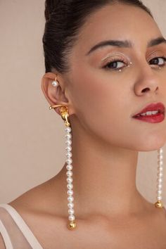 22k gold plated, 925 silver base ear cuffs handcrafted with carved work bird detailed top and white Swarovski pearls embellished long tassel. - Aza Fashions Cuff Jewelry, Jewellery Earrings, Earrings White, Ear Cuffs, Swarovski Pearls, 22k Gold, Long Earrings, Aza Fashion, Online Jewelry