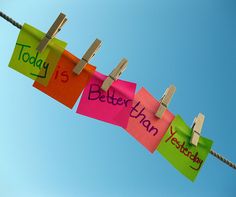 there are many colorful notes hanging on the clothesline with words today is better than yesterday