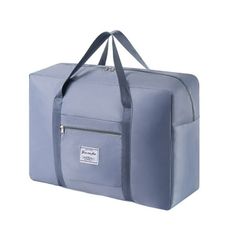 a blue duffel bag sitting on top of a white floor