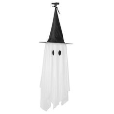 a white and black halloween hanging decoration with two eyes on it's face, wearing a witch hat