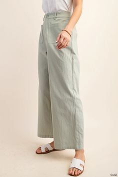 These 100% linen pants will take you from the final days of summer to right into fall. We love the idea of layering them with a oversized chunky cardigan or cropped piece! They are a beautiful light sage, have a zipper front with button, front bucket pockets, a cute wide leg fit and belt hoops. Fit: Run true to size with no stretch Fabric: 100% Linen Available for in-store pickup, use code LOCAL at checkout Knee Length Dresses Casual, Dressy Sweaters, Sage Green Color, Dressy Skirts, Dressy Shorts, Blue Denim Pants, Dressy Pants, Lightweight Pants, Final Days