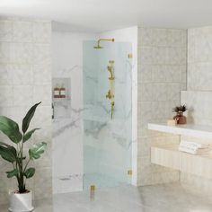 a bathroom with marble walls and flooring, including a walk in shower next to a sink