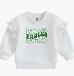 This White and Green Philadelphia Eagles Ruffle crewneck is the perfect addition to your little eagles fan's wardrobe! Check out similar items like this! https://www.etsy.com/listing/744851300/loved-onesie-unisex-baby-onesie-baby?ref=shop_home_active_1&frs=1 https://www.etsy.com/listing/744483004/send-milk-onesie-baby-onesie-bodysuit-0?ref=shop_home_active_5&frs=1 https://www.etsy.com/listing/758369231/sunglasses-onesie-custom-baby-onesie?ref=shop_home_active_4&frs=1 https://www.etsy.com/listing/758372127/hangry-onesie-baby-body-suit-custom?ref=shop_home_active_3&frs=1