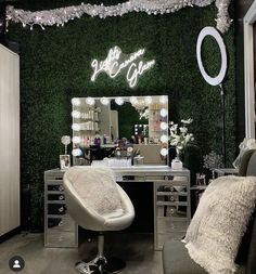 a room with a vanity, chair and mirror