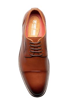 Broguing and burnished details accent a round cap toe lace-up that features anatomical arch support. Round cap toe Broguing details Lace-up Arch support removable insole Leather upper, manmade sole Imported Arch Support, Cognac, Derby, Men's Shoes, Leather Upper, Arch, Size 10, Nordstrom, Lace Up