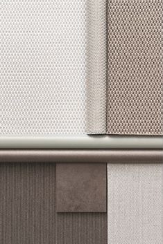 four different shades of grey and white fabric