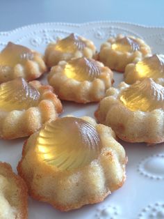 several small pastries on a white plate