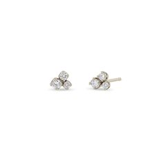 14k gold small cluster stud earrings with three prong set round diamonds of mixed sizes SPECIFICS • earring is approx. 5mm wide• white diamonds .20 ctw• sold as a pair or single Cluster Earrings, Ring Size Guide, Diamond Cluster, White Diamonds, 14kt Gold, Diamond Studs, Bracelet Sizes, Diamond White, Jewelry Care