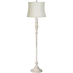 a white floor lamp on a white background