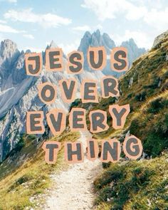 the words jesus over every thing are written on an image of a path in front of mountains