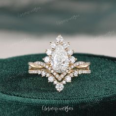 an engagement ring set with a pear shaped diamond