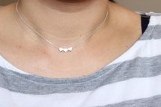 This heart necklace doesn't have initial on it. If you want the initial heart necklace, please follow the link to see itInitial heart necklace:https://www.etsy.com/listing/236533468/tiny-dainty-initial-heart-necklace?ref=shop_home_active_1&ga_search_query=heart%2BnecklaceYou can add more than one heart charm to the necklace. Please select the number of heart charm you want at the drop out menu. Also availalbe in bracelet and anklet. Please go to my shop to see the listings or if you have any que Dainty Heart Charm Necklace For Best Friend, Dainty Heart Charm Necklace For Best Friend Gift, Cute Jewelry For Best Friend Gift, Dainty Silver Heart Pendant Initial Necklace, Dainty Heart Pendant Necklace For Best Friend, Dainty Heart Pendant Charm Necklace For Best Friend, Heart Charm Jewelry For Bridesmaid Gift, Heart Shaped Charm Necklaces For Best Friend, Heart-shaped Charm Necklaces For Best Friend