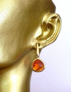 Beautiful Orange and 16k Gold Earrings Small dangle earrings on gold post Almost 1 inches  long.  If you have any questions, please feel free to message us!  All monitors display color differently; please takes this into consideration when placing your order If this is a gift and you need a note, please add so in the "notes" section when checking out. Gold Hypoallergenic Crystal Earrings For Formal Occasions, Elegant Orange Pierced Earrings, Pierced Yellow Gold Crystal Earrings As Gift, Yellow Gold Pierced Crystal Earrings For Gift, Yellow Gold Pierced Crystal Earrings As Gift, Gold Nickel-free Teardrop Earrings For Anniversary, Orange Pierced Earrings For Formal Occasions, Gold Long Drop Pierced Crystal Earrings, Orange Dangle Earrings For Formal Occasions