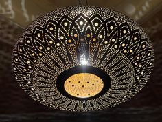 a decorative light fixture hanging from the ceiling