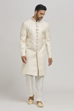 White sherwani with scallop, floral embroidery. Paired with a pant. - Aza Fashions Elegant Sherwani With Chikankari Embroidery For Diwali, Off White Fitted Bandhgala For Diwali, Fitted Off White Bandhgala For Diwali, Designer Off White Kurta For Eid, Designer Off-white Kurta For Eid, Elegant Traditional Style Kurta, Elegant Traditional Fit Sherwani For Festive Occasions, Designer Off White Festive Sets, Fitted Off-white Bandhgala For Diwali