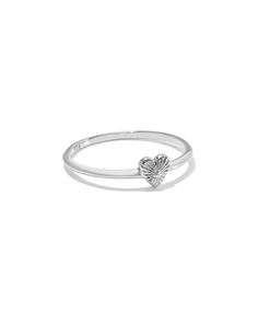 The dainty details of the Maia Heartburst Band Ring in Sterling Silver have stolen our hearts. An homage to the traditional jewelry technique of hand engraving, this ring features an etched design resembling a bursting heart. Crafted in long-lasting metal, you’ll love this ring season after season. Metal Sterling Silver Why Sterling Silver? Our Sterling Silver collection features elevated styles to wear time and time again. With a base of both pure silver and copper, Sterling Silver provides a p Kendra Scott Ring Silver, Dainty Silver Wedding Ring, Heirloom Engraved Heart Ring For Promise, Heirloom Engraved Heart Promise Ring, Sterling Silver Engraved Heart Open Ring, Engraved Sterling Silver Open Heart Ring, Engraved Sterling Silver Heart Open Ring, Promise Engraved Heart Ring In Sterling Silver, Sterling Silver Heart-shaped Engraved Ring