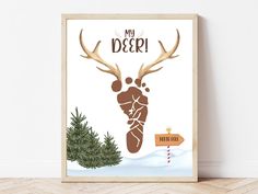 a christmas card with an image of a reindeer holding a sign that says, my deer is