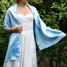 A very elegant satin shawl for your wedding party or evening dress. Made of a classical satin. Color: light blue ( other colors are available ) Size : 170 cm x 40 cm You can use it as a wrap, shawl or stola. WE have matching bags in our Etsy Shop! WE accept credit cards! Elegant Blue Silk Scarf For Evening, Elegant Blue Satin Silk Scarf, Elegant Silk Scarf With Satin Finish For Weddings, Elegant Blue Shawl For Evening, Elegant Blue Silk Shawl, Elegant Blue Silk Scarf For Wedding, Elegant Blue Shawl, Elegant Blue Silk Shawl Scarf, Elegant Satin Shawl For Wedding