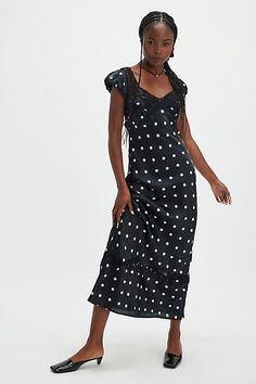 Perfect in polka dot, this stunning maxi dress is featured in a classic, A-line silhouette with butterfly lace-adorned neckline and slightly puffed capped sleeves for an added timeless touch. **Fit:** Staple, A-line fit **Features:** V-neckline, butterfly lace mesh at bust & hem, bias-inspired fit, exposed back detail, defined cap sleeves, keyhole back feature **Why We | Butterfly Babe Maxi Dress by Free People in Black, Size: XL Fitted Polka Dot Maxi Dress, Elegant Polka Dot Maxi Dress With Short Sleeves, Fitted Polka Dot Ruffled Maxi Dress, Fitted Polka Dot Maxi Dress With Ruffles, Chic Polka Dot Dresses With Lace Trim, Elegant Polka Dot Dress With Square Neck, Elegant Polka Dot Dress With Lace Trim, Elegant Polka Dot Maxi Dress With Ruffles, Fitted Polka Dot Dress With Lace Trim