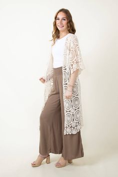 The perfect lightweight cardigan for transitioning into the warmer weather is this Long Swirl Crochet Kimono for Women in Ivory! Featuring a lightweight crochet construction, long length, and neutral color, this piece can be layered over any tee or brami! Features:Do everything in love Style: ZLC410052-IVORYColor: Ivory100% CottonWomen’s Cardigan3/4 sleeve length Open cardiganCrochet material with long swirl design Measurements from one size:Length from center back: 46" Swirl Crochet, Crochet Construction, Crochet Kimono, Do Everything In Love, Love Style, Lightweight Cardigan, Swirl Design, Open Cardigan, Crochet Cardigan