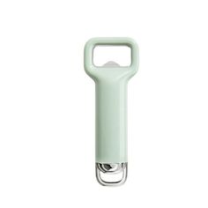 a light green plastic bottle opener on a white background