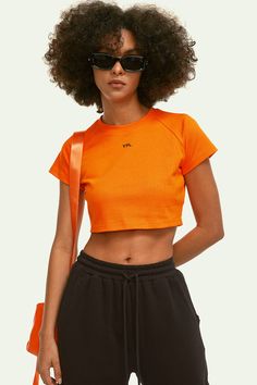 This YPL Crop Finesse Short Sleeve is the perfect addition to your wardrobe. Featuring a cropped short sleeve, on-trend silhouette and soft, sueded performance cotton, you'll get the modern style you're looking for without compromising on comfort. Plus, a signature logo on the front adds the perfect finishing touch. Sporty Cropped T-shirt With Short Sleeves For Spring, Sporty Short Sleeve Cropped T-shirt For Spring, Sporty Cropped T-shirt With Short Sleeves For Summer, Sporty Short Sleeve Crop Top For Summer, Sporty Short Sleeve Crop Top For Spring, Trendy Short Sleeve Crop Top, Sporty Solid Cropped T-shirt For Spring, Short Sleeve Crop Top For Summer Streetwear, Athleisure Women