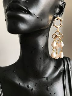 "🤗I'm very excited to present you a new pair of earrings that could make any woman satisfied and happy ! The earrings are composed of pearls and gold filled brass accessories. I used 6 pieces of pearls on each earring, that makes 12 pieces on a pair, the pearls doesnt not make any heaviness or pressure on the earlobe. The earrings are light and do not cause any kind of allergy 🙏 The pearls have a diameter of 8 mm , and have shiny white color . ❗ Feel free to contact me for item questions. Each item is individually wrapped in kraft jewelry gift box. If you want to add a gift note to the package, please leave a note in the \"add note to YouNiqueJewelscrafts\" message box at the checkout.🙏 🛫Please check your address details during the worder for excluding any unwanted problems ! Dont forg Pearl Chandelier Earrings For Party, Pearl Charm Chandelier Earrings For Party, Pearl Charm Dangle Chandelier Earrings For Party, Pearl Chandelier Earrings With Pearl Chain As Gift, Party Drop Pearl Earrings With Dangling Beads, Party Pearl Drop Earrings With Dangling Beads, Gold Pearl Earrings With Dangling Beads For Party, Pearl Chandelier Earrings With Dangling Beads, Dangle Chandelier Earrings With Pearl Charm