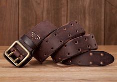 Make yourself unique with a Men's Handmade Stap Buckle Belt. This statement piece features an authentic shoulder strap, handcrafted for rugged luxury. The unique buckle adds a conversational detail that lets you express your style. The belt's versatility allows it to be worn with a wide range of outfits, from jeans and T-shirts to suits and dress pants, making it ideal for both casual and formal occasions. Unlike mass-produced belts, the handmade construction guarantees a unique quality with sma Vintage Belts With Brass Buckle For Everyday Use, Adjustable Belts With Antique Buckle For Everyday Use, Vintage Adjustable Belts And Suspenders With Brass Buckle, Vintage Adjustable Belt With Brass Buckle, Vintage Belts And Suspenders With Removable Belt, Vintage Belts And Suspenders For Everyday Use, Vintage Distressed Brown Belt For Everyday Use, Vintage Leather Strap Belt For Everyday Use, Vintage Brown Belts And Suspenders With Adjustable Strap