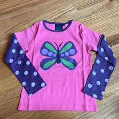 This New Without Tag Long Sleeve Tee Is By Mini Boden. It Is A Size 7-8 And Is Pink. It Features A Beautiful Butterfly In Front With Purple Sleeves And Piping Around The Neckline. Such A Fun And Great Shirt. Think Back To School! Playful Fitted Purple Tops, Long Sleeve Cotton Tops With Butterfly Print, Cute Long Sleeve Purple T-shirt, Purple Long Sleeve Tops For Playtime, Butterfly Shirt, People Clothes, Rainbow Shirt, Purple Butterfly, Mini Boden