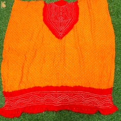 Category: Bandhani Fabric Fabric - Pure Gajji Silk Color - Red & Orange Weave: Bandhani derived from a Sanskrit word Banda which meaning “to tie” is truly an art that involves dyeing a fabric tied tightly with a thread at several points, producing a variety of patterns and then dyed with extraordinary colors. Kurta and dupatta set Note- There may be slight color variations due to photographic reasons. This is a hand-woven product and any irregularities in the weaving or pattern should not be tak Bohemian Bandhani Print Choli For Traditional Ceremonies, Red Bandhani Print Traditional Wear For Festival, Red Traditional Wear With Bandhani Print For Festivals, Red Bandhani Traditional Wear For Festival, Bohemian Bandhani Traditional Wear For Ceremonies, Multicolor Bandhani Print Blouse For Traditional Ceremonies, Traditional Yellow Bandhani Print Sets, Chanderi Traditional Wear With Bandhani Print For Festivals, Traditional Yellow Sets With Bandhani Print