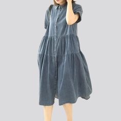 Feel the nostalgia of the Y2K era and the vibrancy of the 2023 Spring-Summer Collection with this amazing medium wash medium-wash women's jean dress! Exuding both elegance and edge. this fit and flare casual dress is the perfect addition to your wardrobe.Why You'll Fall In LoveTailored to perfection with intricate painted prints. a sanded finish. and a unique combination of suspenders and a buttoned closure for added style. this dress is sure to make you stand out in any crowd.Unmissable Highlig Medium Wash Denim Midi Dress With Short Sleeves, Denim Blue Short Sleeve Cotton Midi Dress, Denim Blue Cotton Midi Dress Short Sleeve, Denim Blue Short Sleeve Midi Dress, Short Sleeve Denim Blue Midi Dress, Washed Blue Short Sleeve Dress With Pockets, Dark Wash Knee-length Denim Dress, Casual Short Sleeve Denim Midi Dress, Knee-length Dark Wash Denim Dress